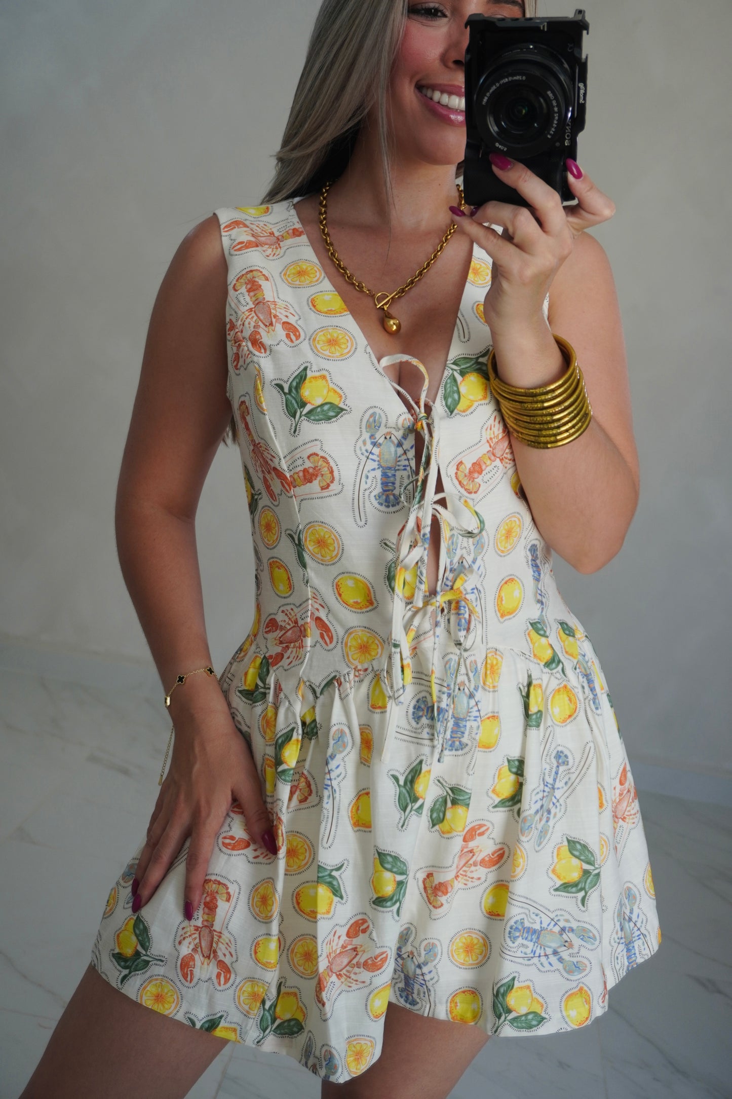 YELLOW PRINTED ROMPER