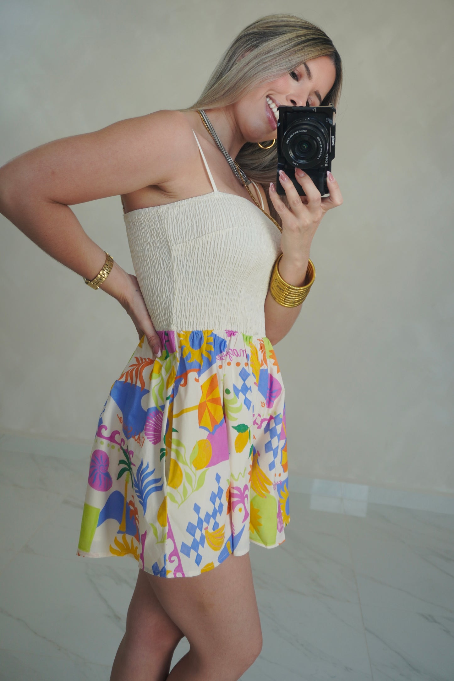 PRINTED SMOCKED ROMPER