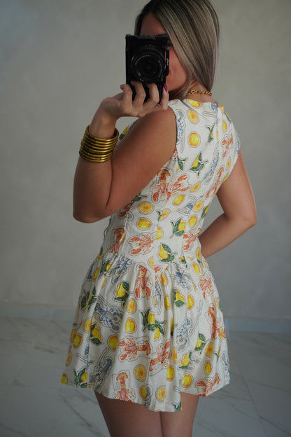 YELLOW PRINTED ROMPER