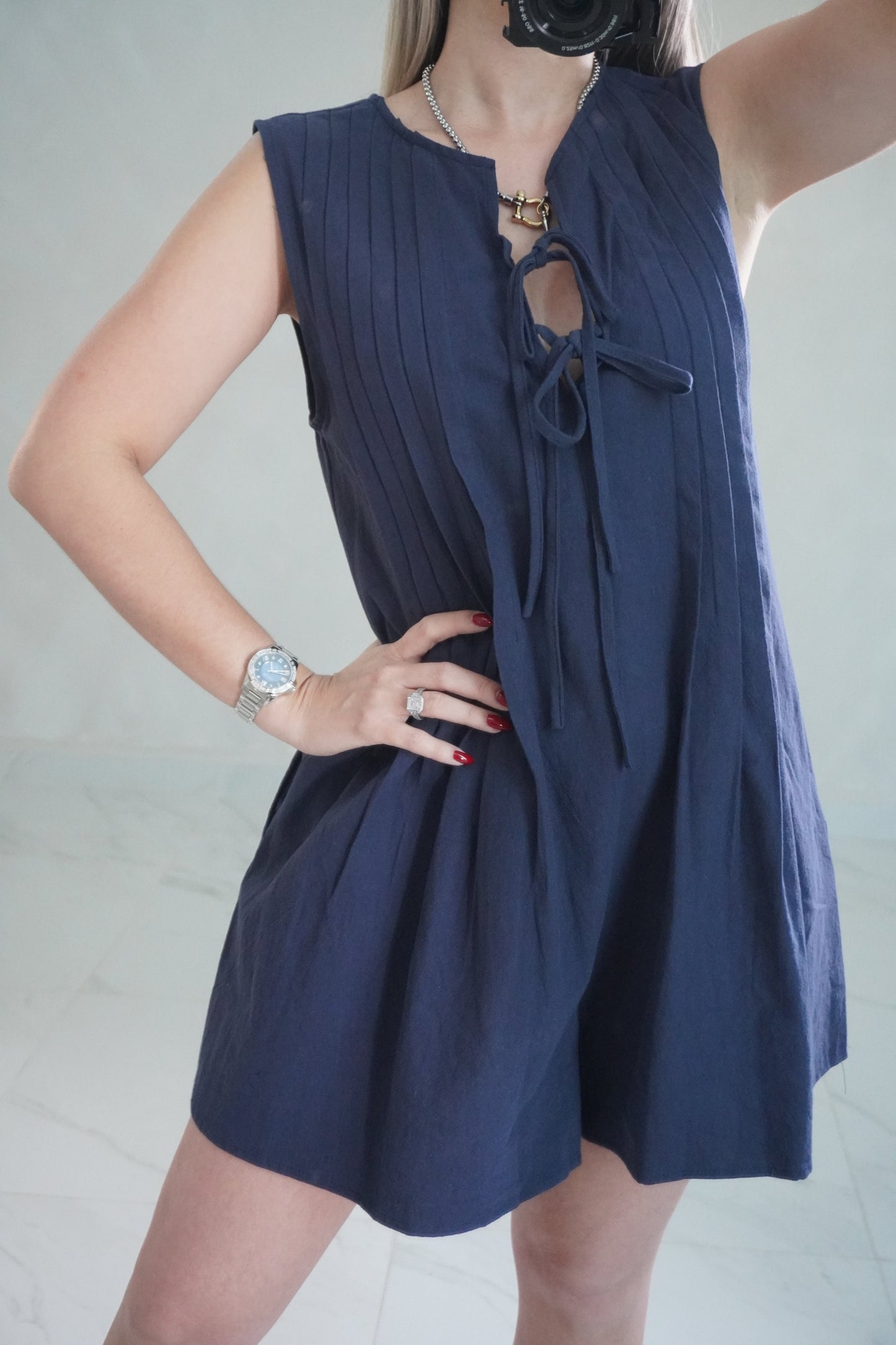 NAVY PLEATED ROMPER