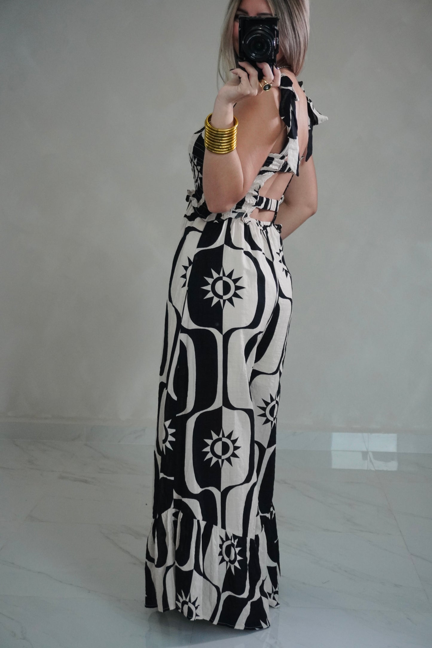 SMOCKED PRINTED JUMPSUIT