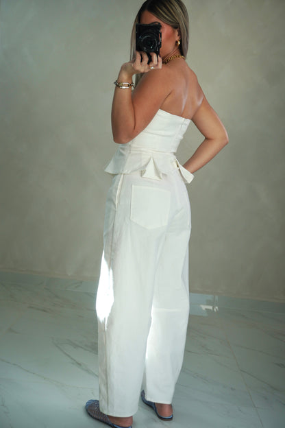 STRAPLESS PEPLUM BARREL JUMPSUIT