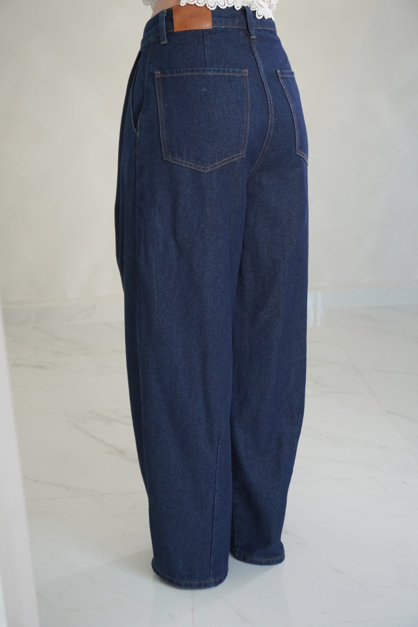 MID-RISE PLEAT DENIM PANTS