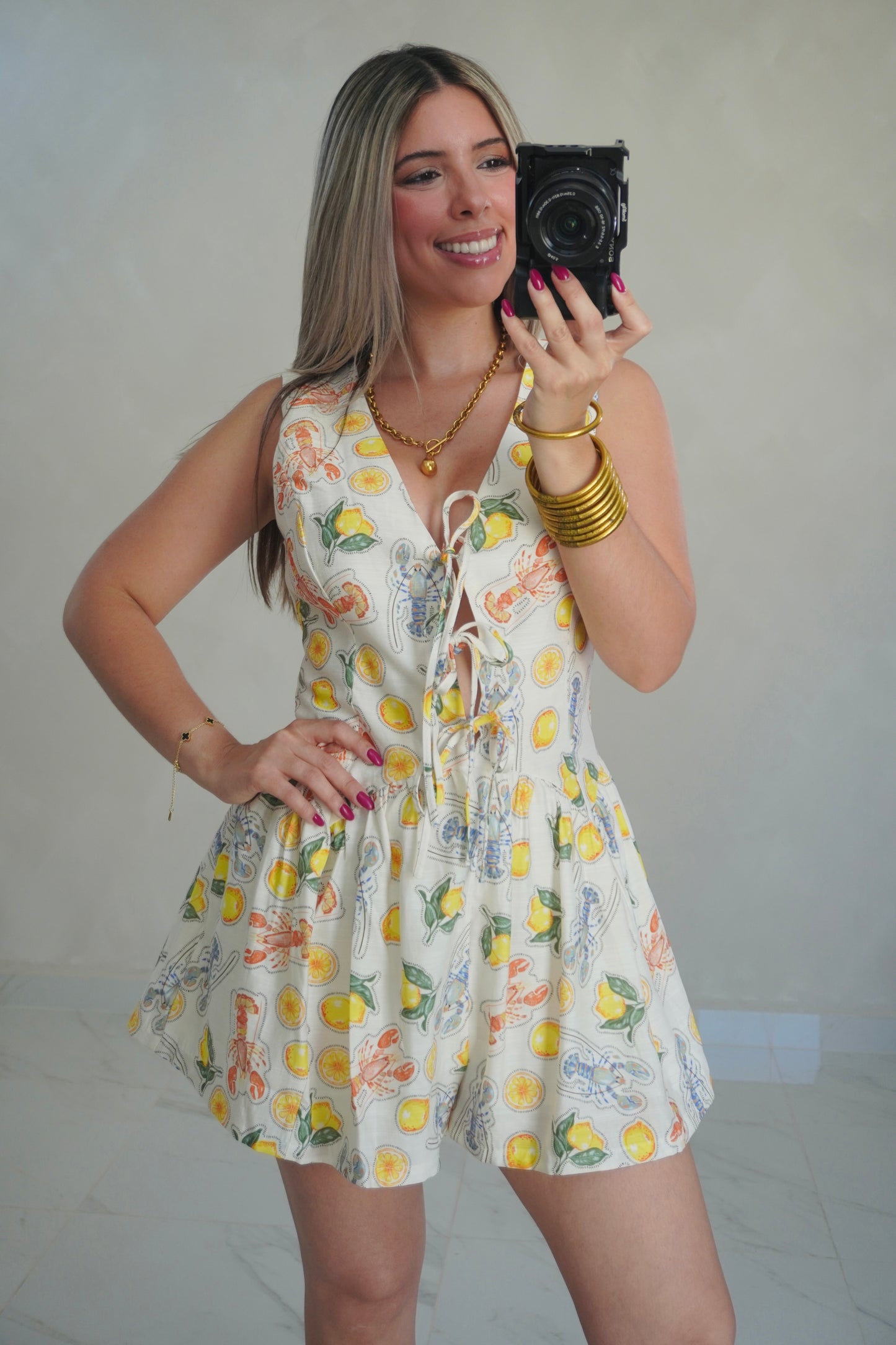 YELLOW PRINTED ROMPER