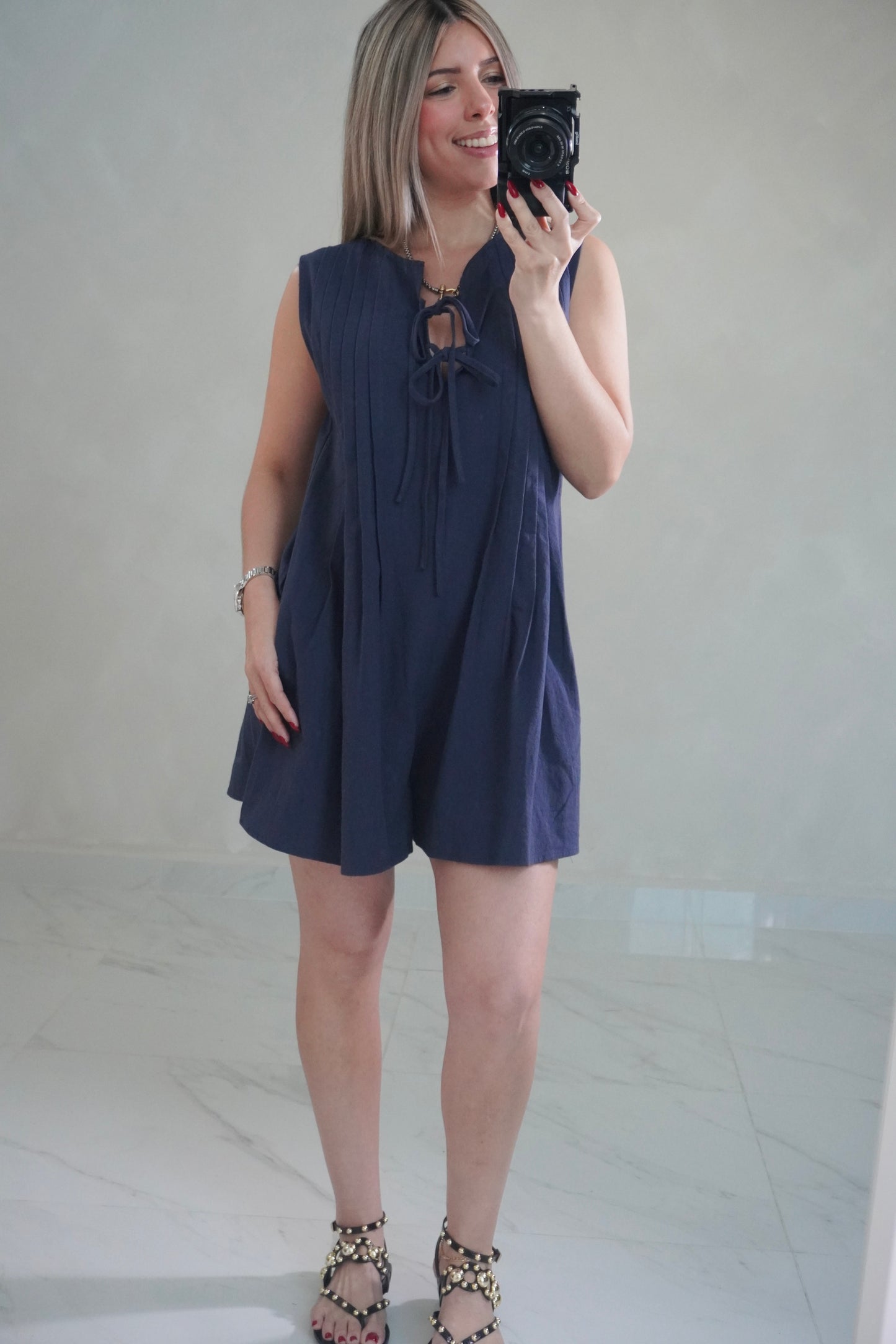NAVY PLEATED ROMPER